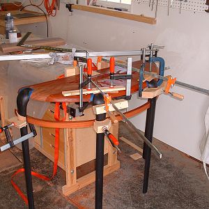 Demilune table clamp up