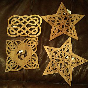 2 star trivets and 2 celtic ones