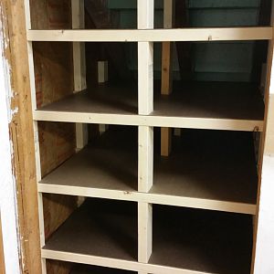 Under-stairs wood rack