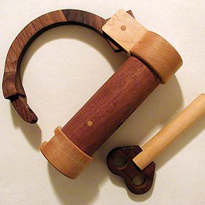 Shackle style wooden lock