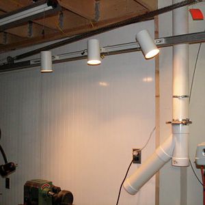 Old track lighting finds second life in shop
