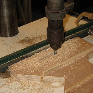 Routing the adjustment slot in the drill press