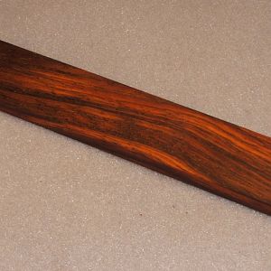 Rosewood (cocobolo) strip for final ladder, as planed from router-table
