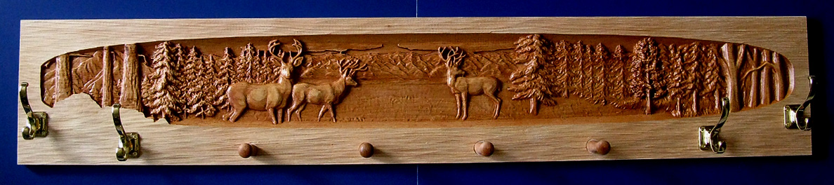 Coat Rack with carved Wilderness Scene