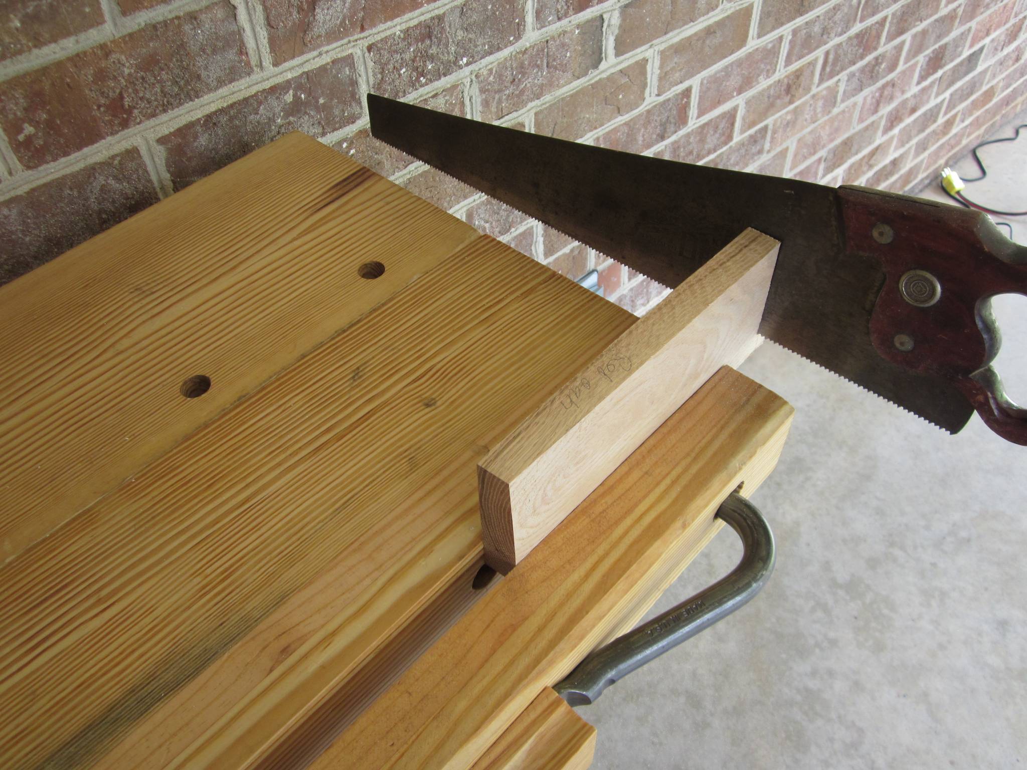Portable woodworking bench