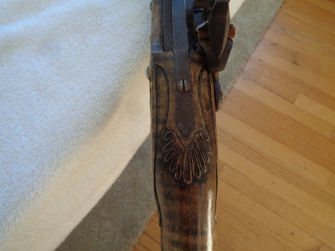 tang carving Tom's rifle