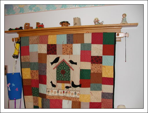 Wall quilt rack and shelf