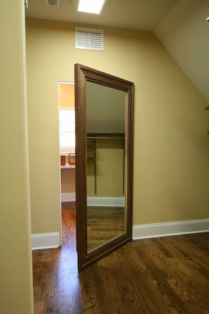 Hidden office door in walnut