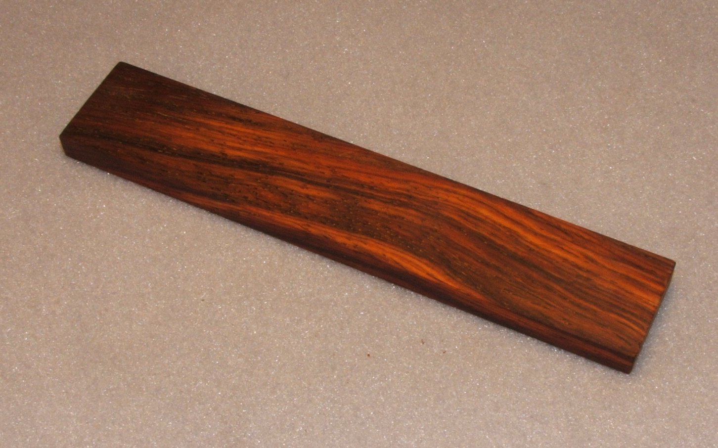 Rosewood (cocobolo) strip for final ladder, as planed from router-table