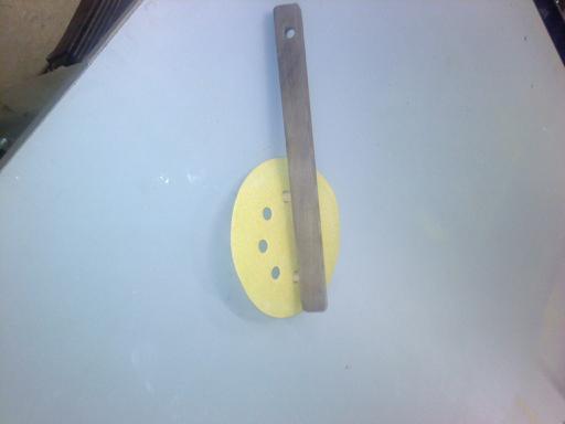 Shopmade tool to assist in installing sanding disks on Random Orbital Sande